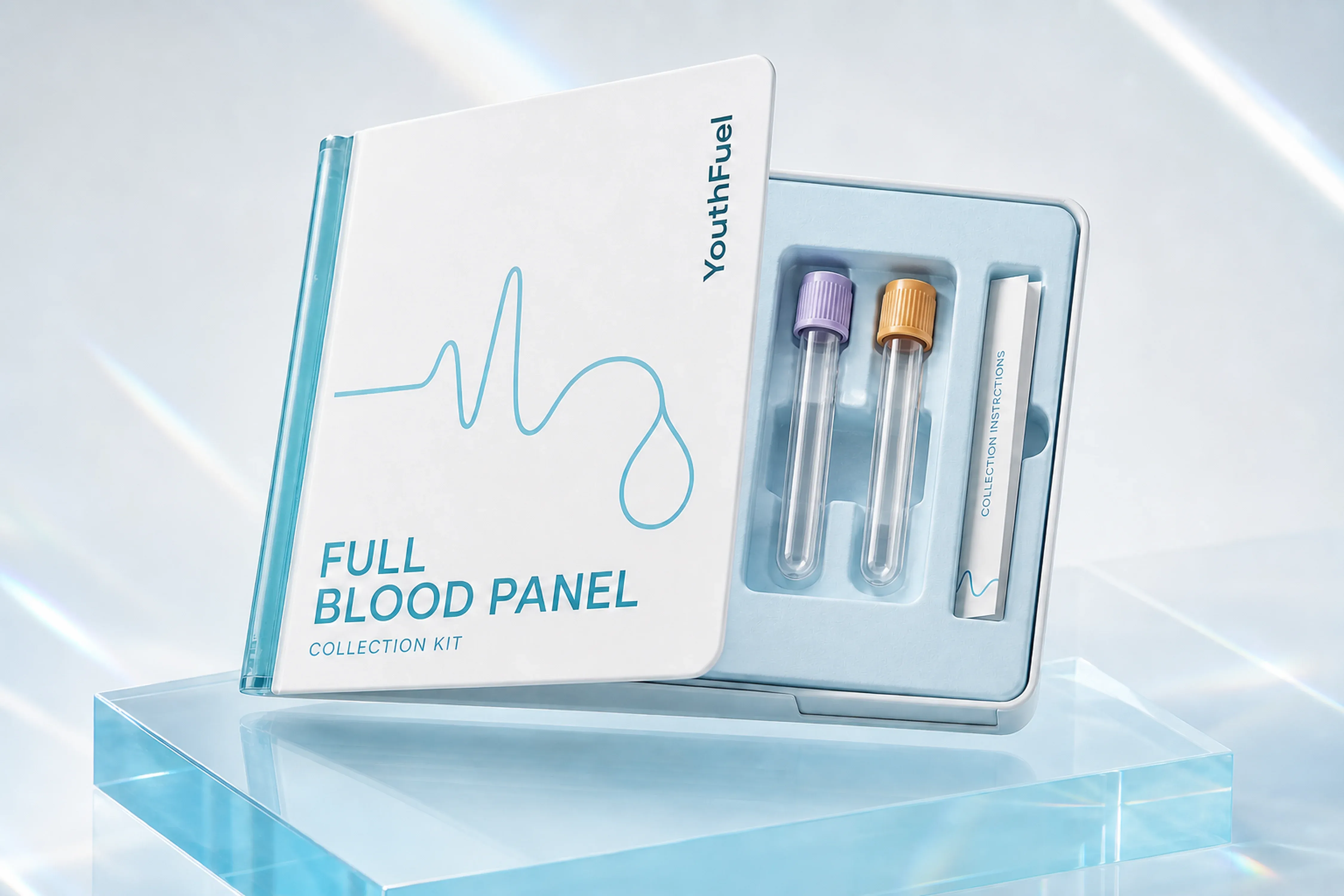 YouthFuel Full Blood Panel collection kit with two clear specimen tubes floating over a reflective blue studio surface.