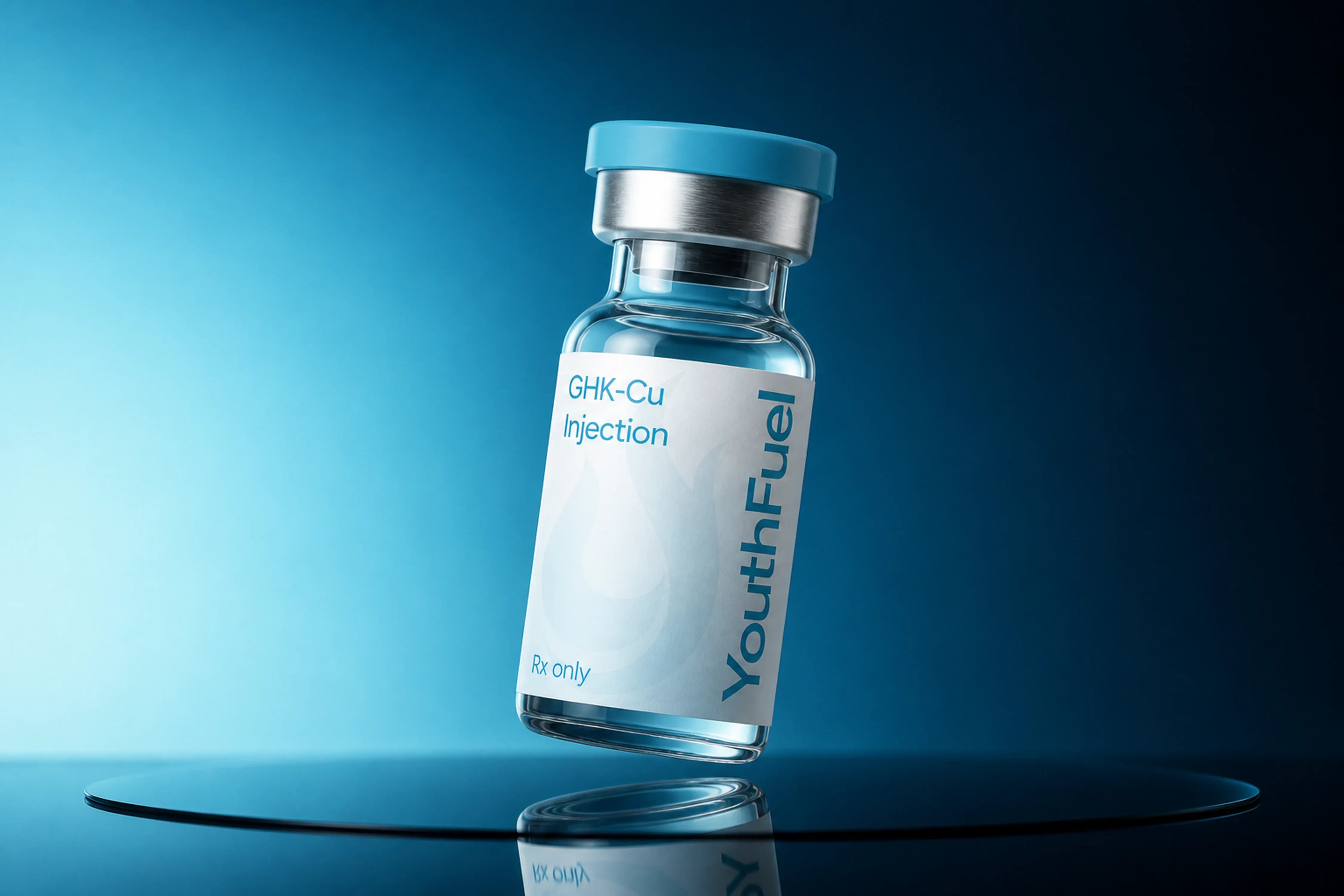 YouthFuel GHK-CU injection vial floating over a reflective blue studio surface.