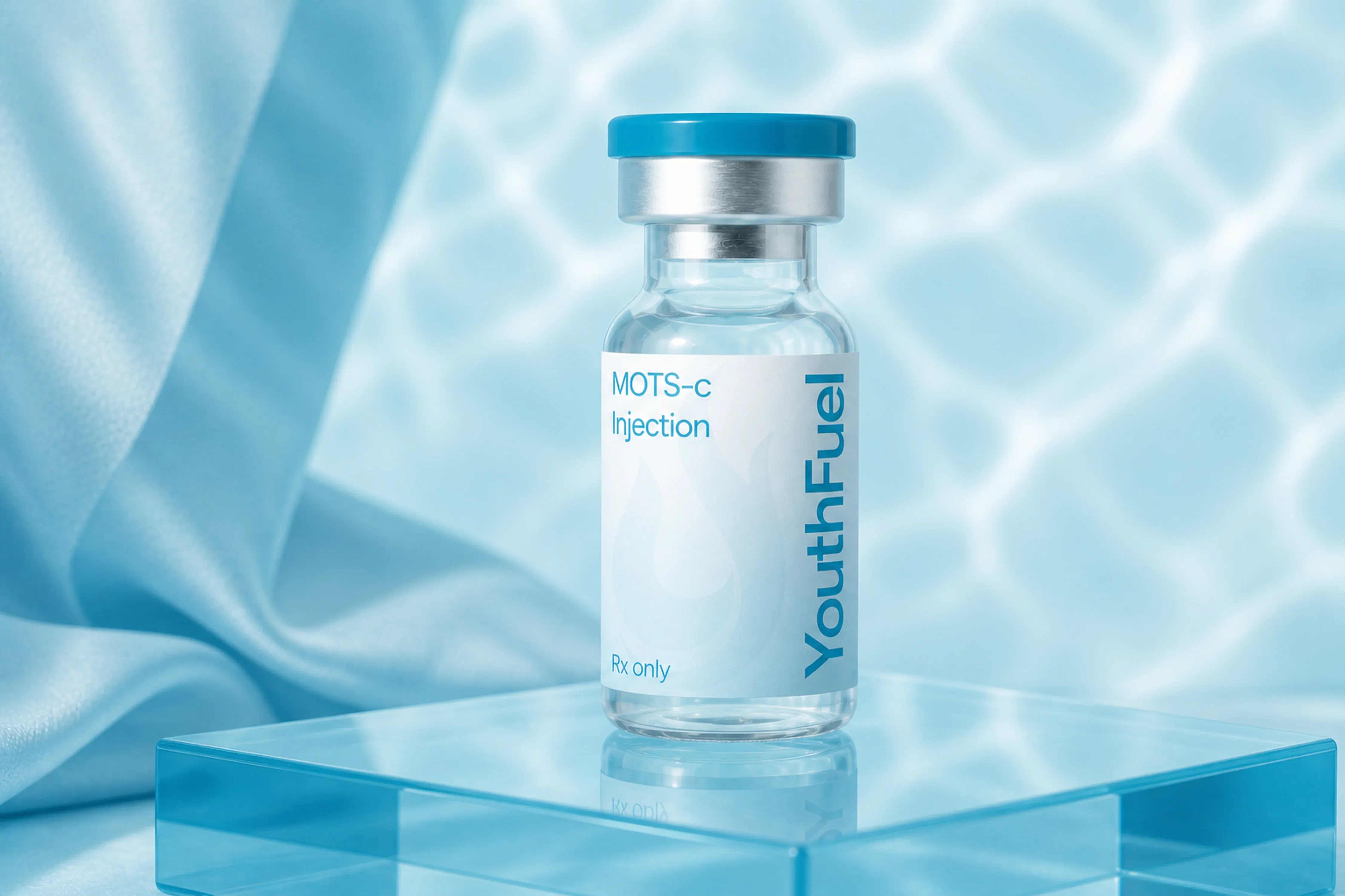 YouthFuel MOTS-C injection vial on a clear pedestal with aqua light.