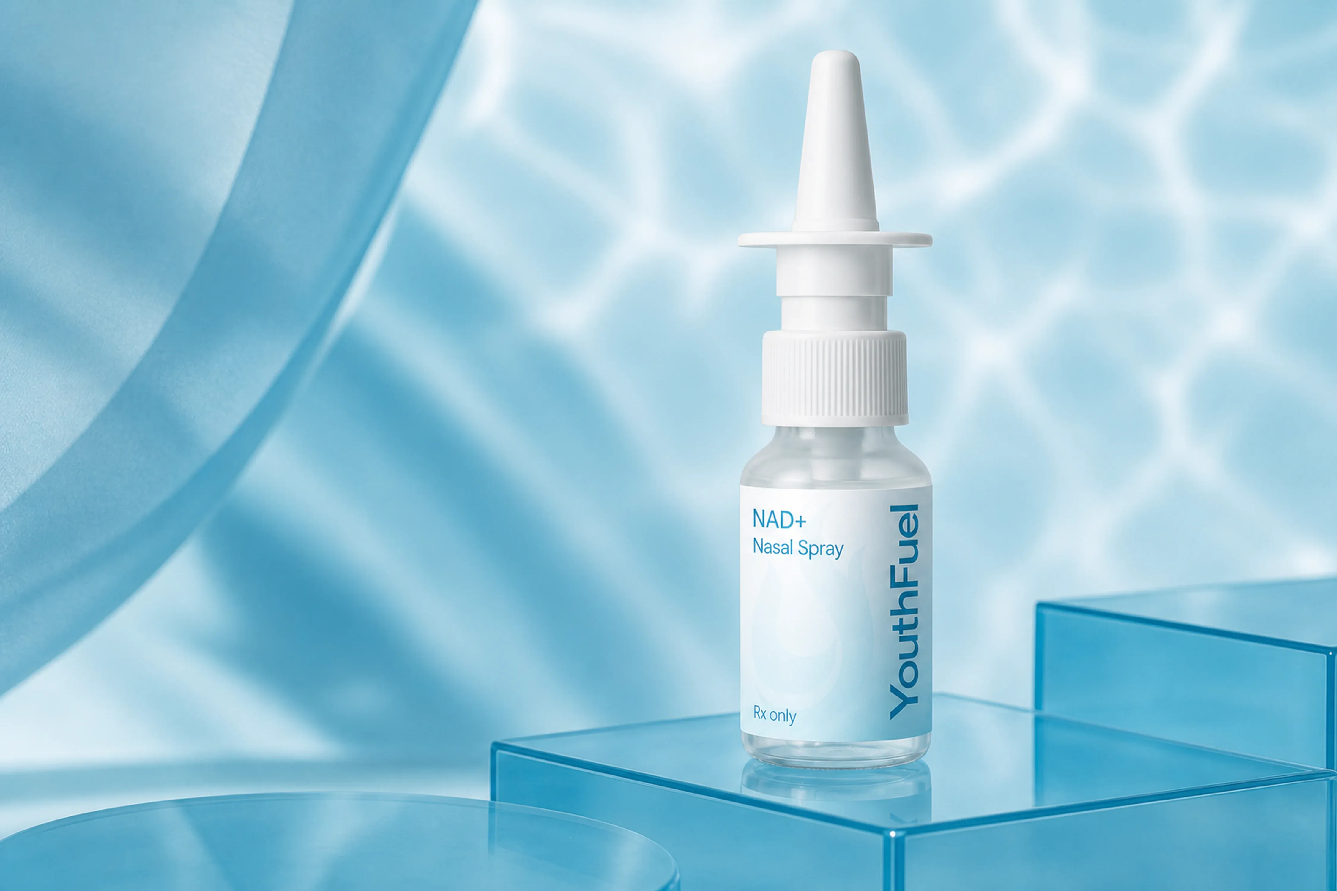 YouthFuel NAD+ Nasal Spray nasal spray bottle on a clear pedestal with aqua light.