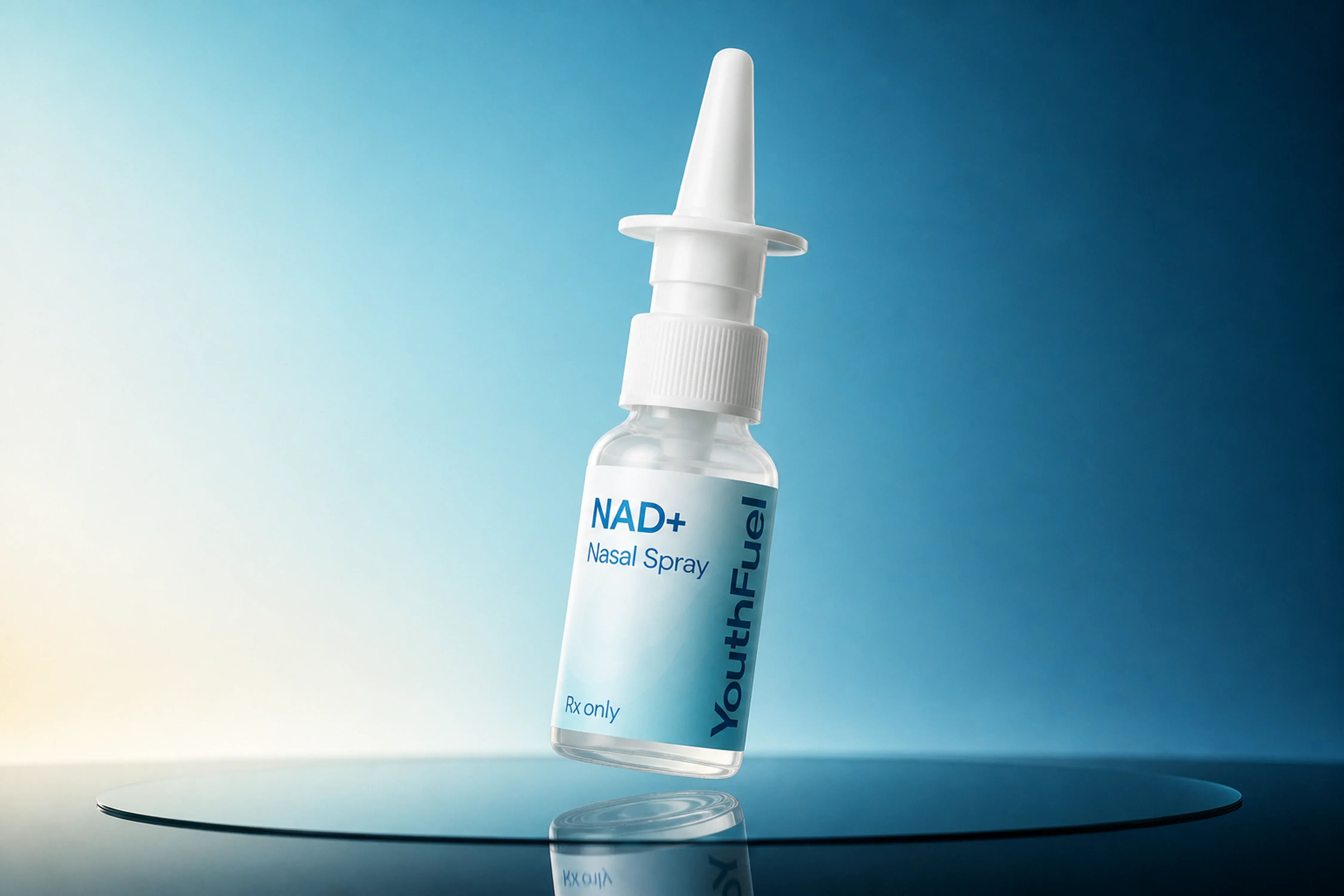 YouthFuel NAD+ Nasal Spray nasal spray bottle floating over a reflective blue studio surface.