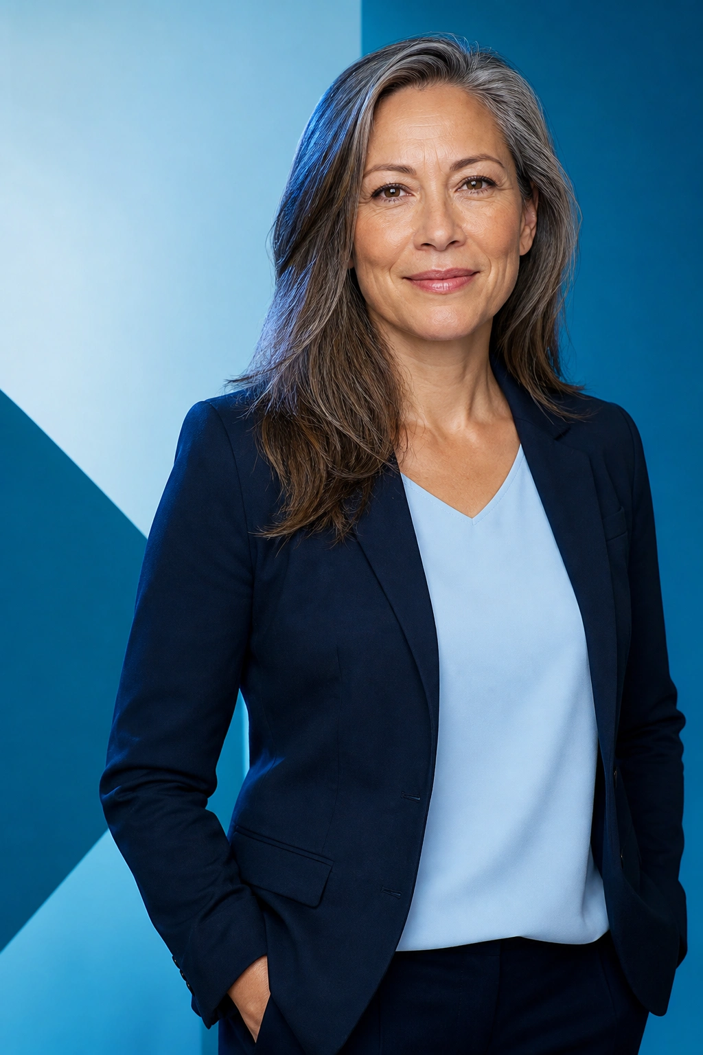 Confident midlife woman in a blue editorial portrait